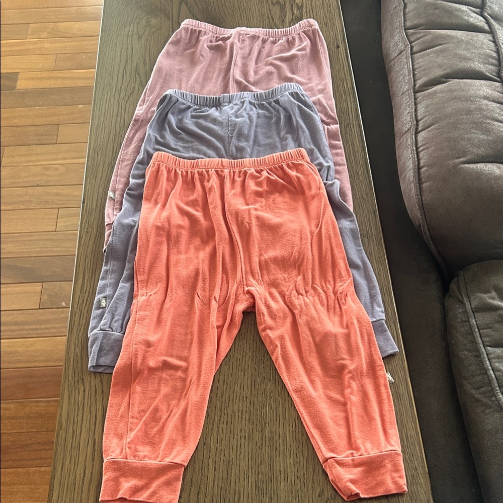 Set of Three Kyte BABY Pants in Coral, Mauve, and Purple - Picture 2 of 2